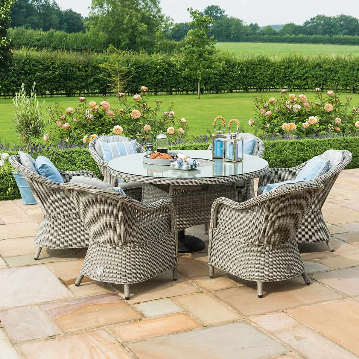 Light grey rattan 6 seat round ice bucket dining set with heritage chairs