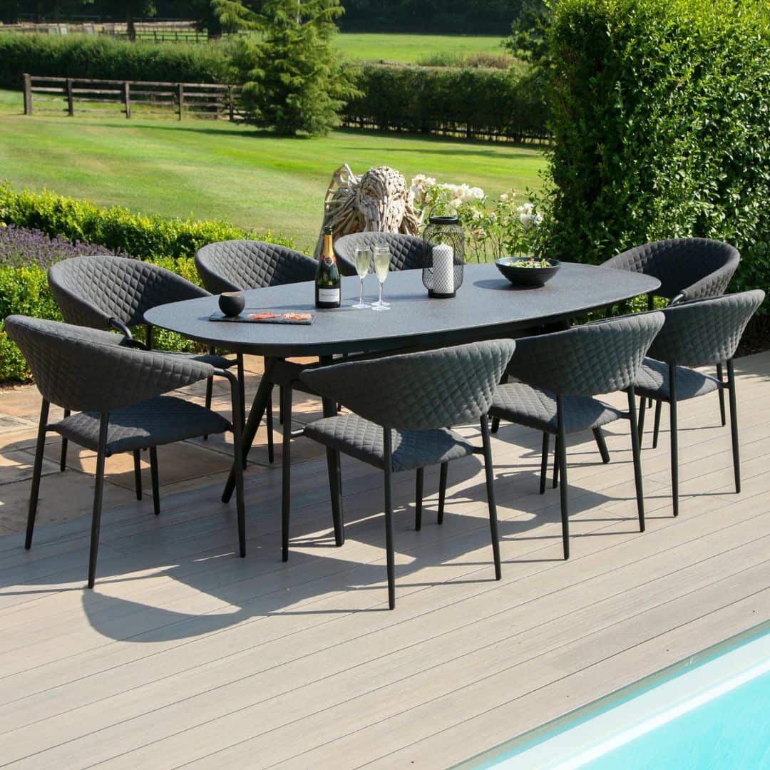 Fabric 8 seat oval dining set with quilted chairs #colour_charcoal