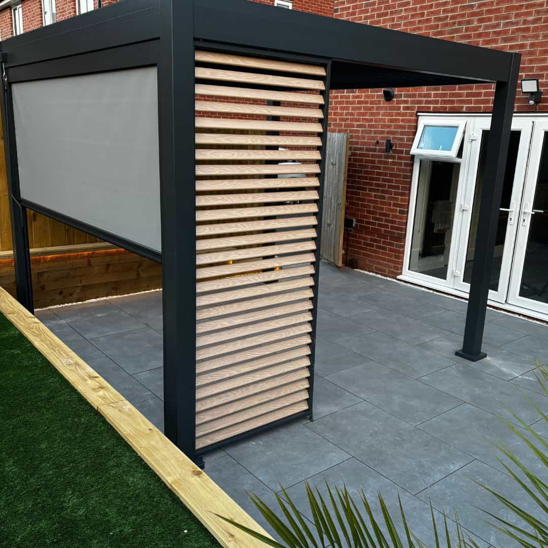 1m light oak aluminium fixed louvred side panel on a aluminium pergola