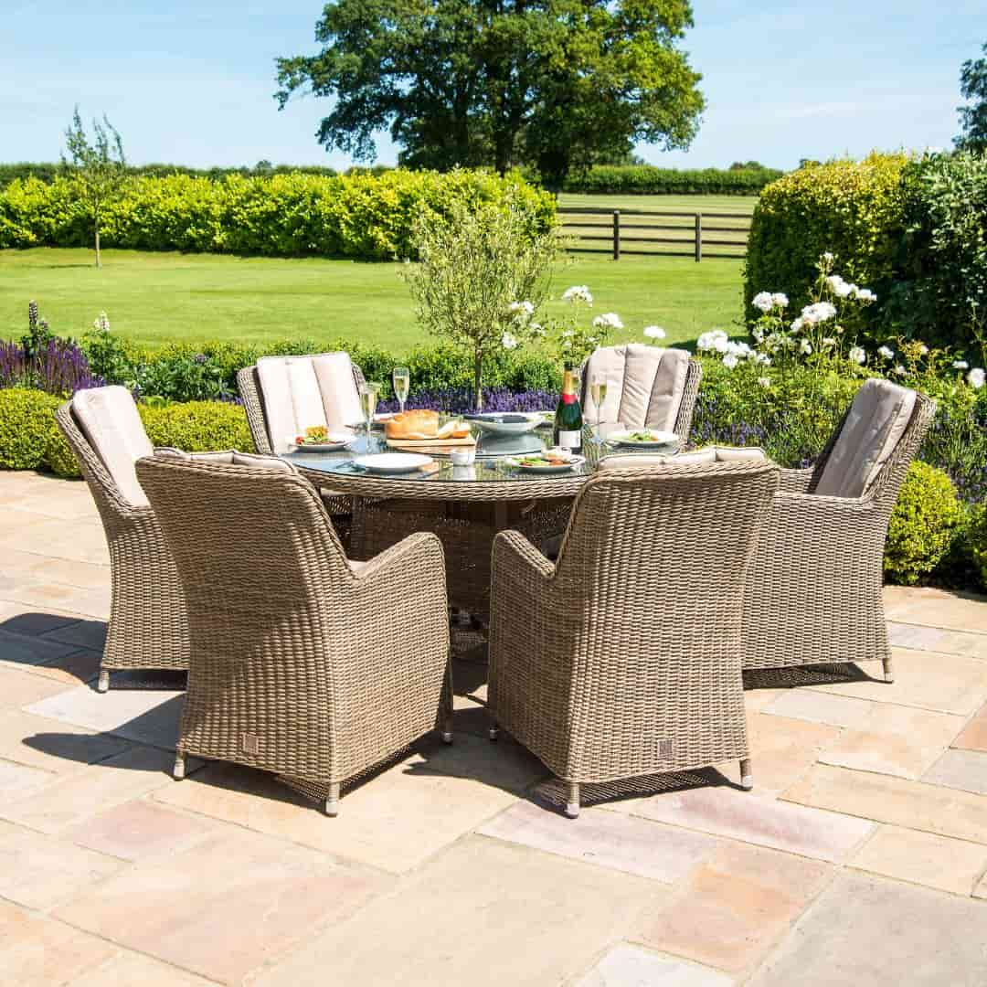 Natural coloured rattan 6 seat round fire pit dining set with Venice chairs and lazy susan