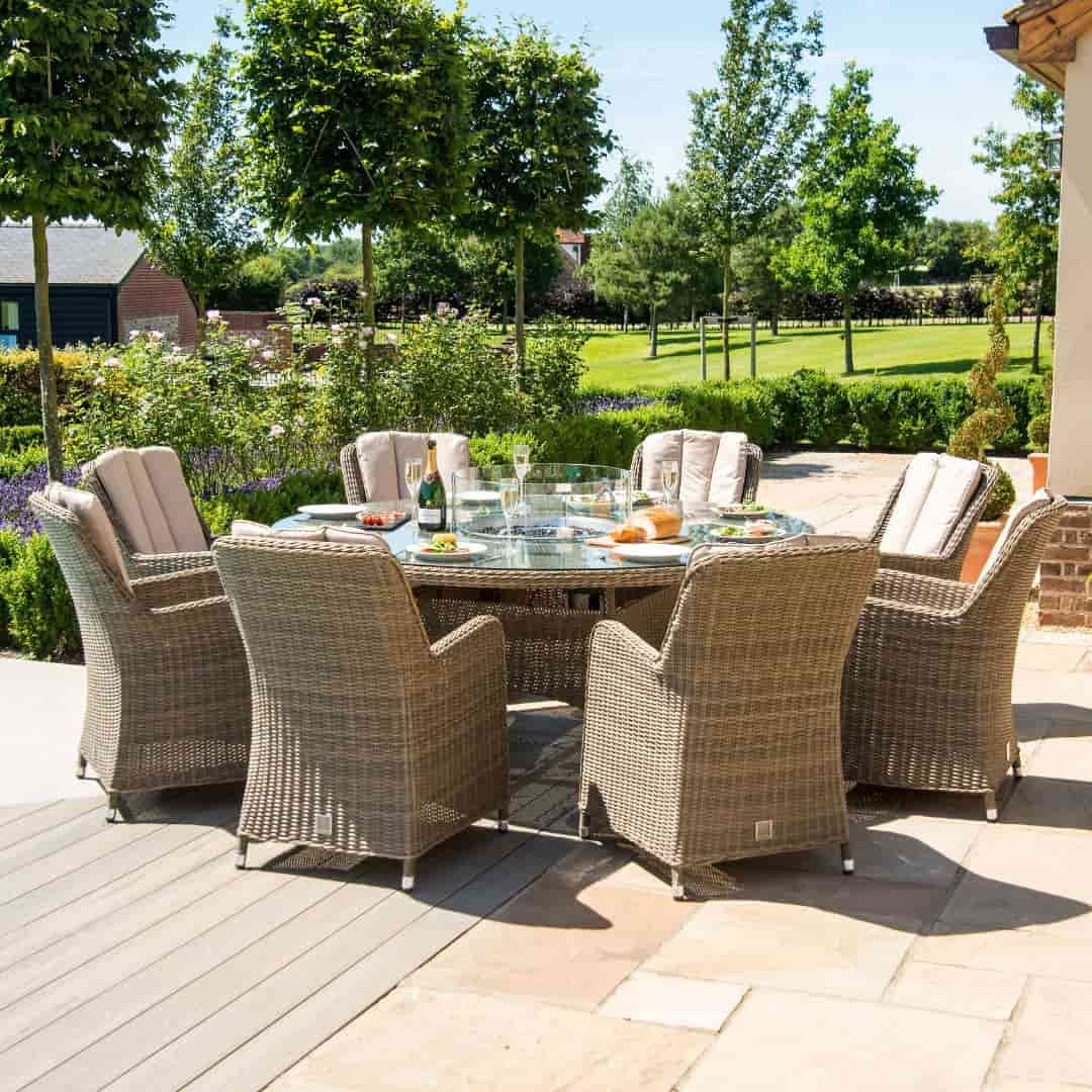 Natural coloured rattan 8 seat round dining set with fire pit