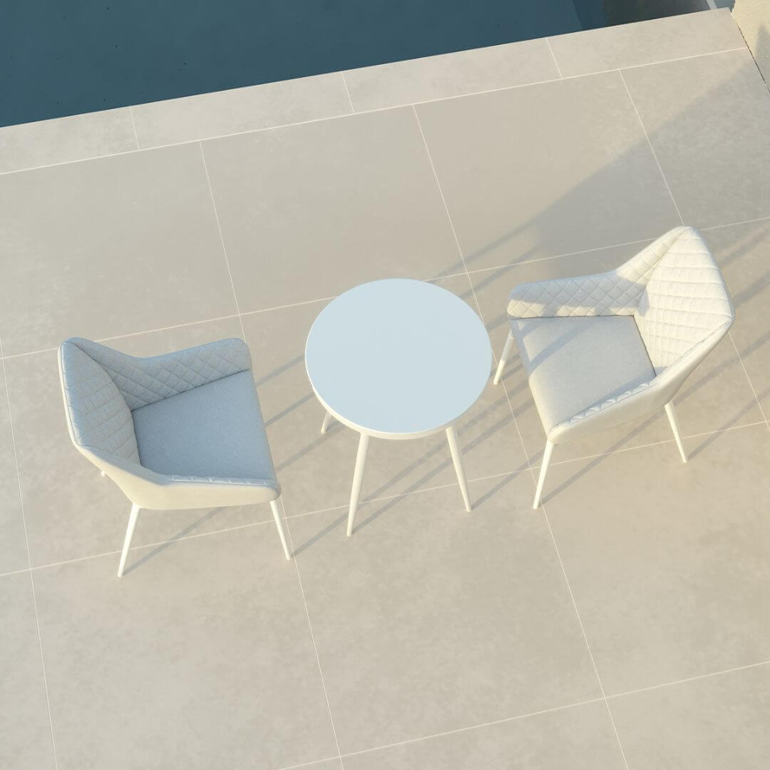 Overhead view of a 2 seat bistro set with white round table and light grey fabric chairs #colour_lead chine