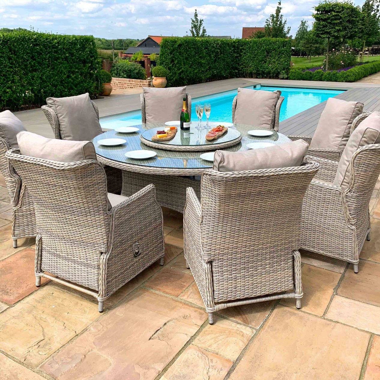 Cotswold Reclining 8 Seat Round Dining Set 
(with woven Lazy Susan)