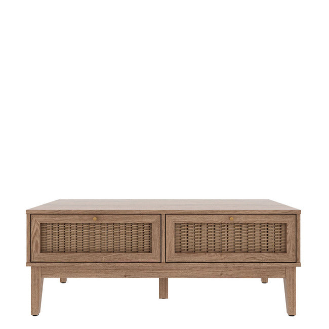 Oak coloured 2 drawer coffee table with rattan fronts and gold handles.