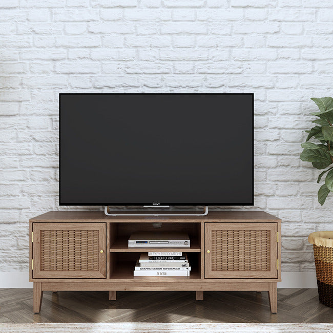 Oak coloured TV and media unit with 2 rattan front doors and shelves.