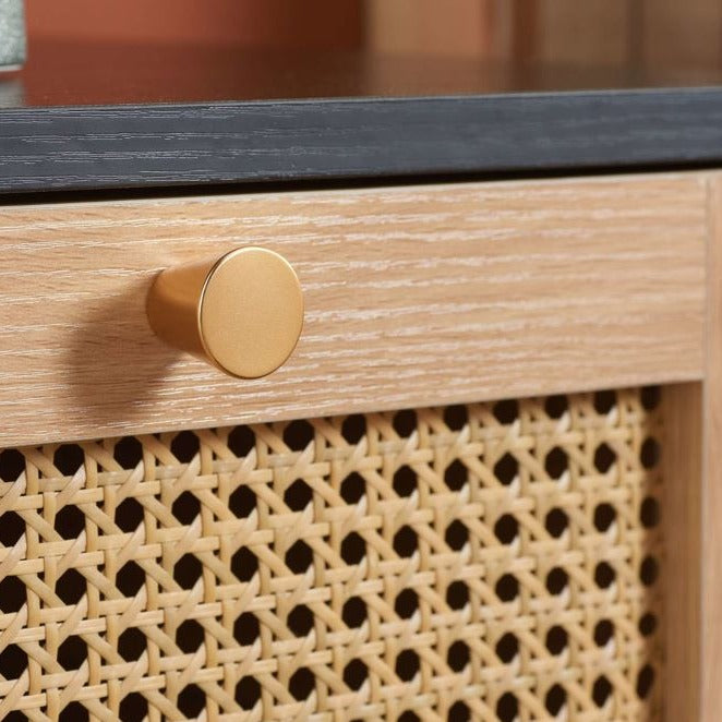 Close up of the rattan drawer front with handle.