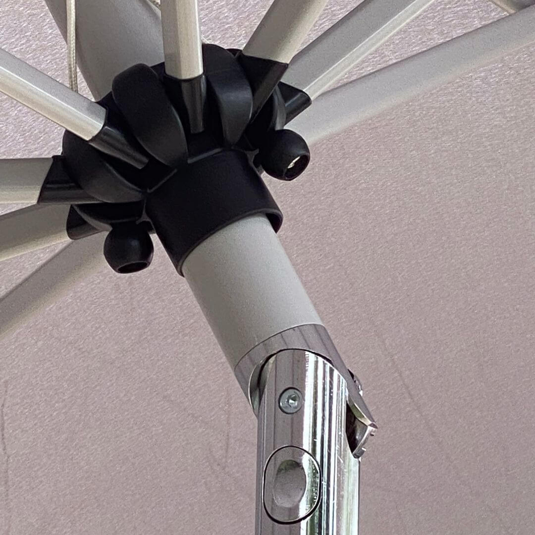 Close up of a parasol tilt mechanism.