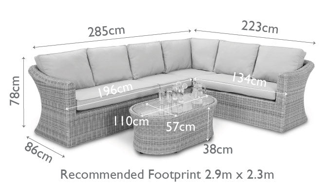 Diagram of a corner sofa and oval coffee table.