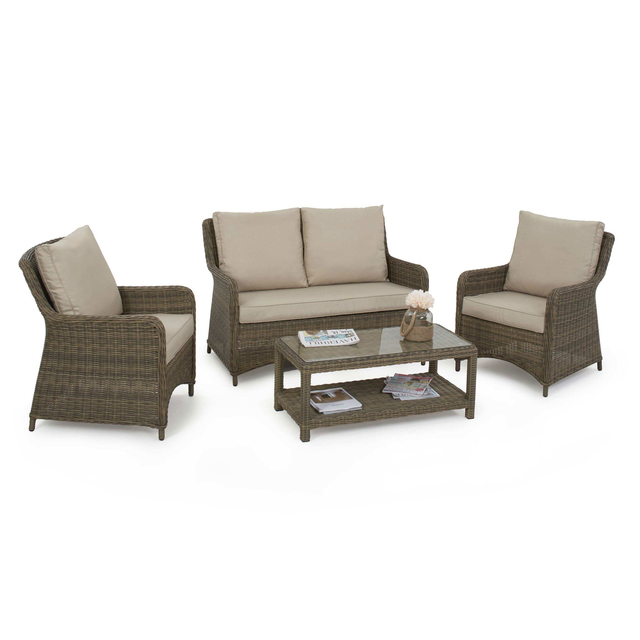 Natural coloured rattan 2 seat sofa with two arm chairs and a rectangle coffee table.