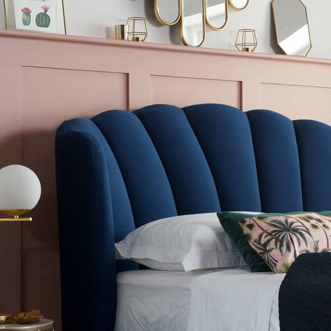 Blue fabric ottoman bed